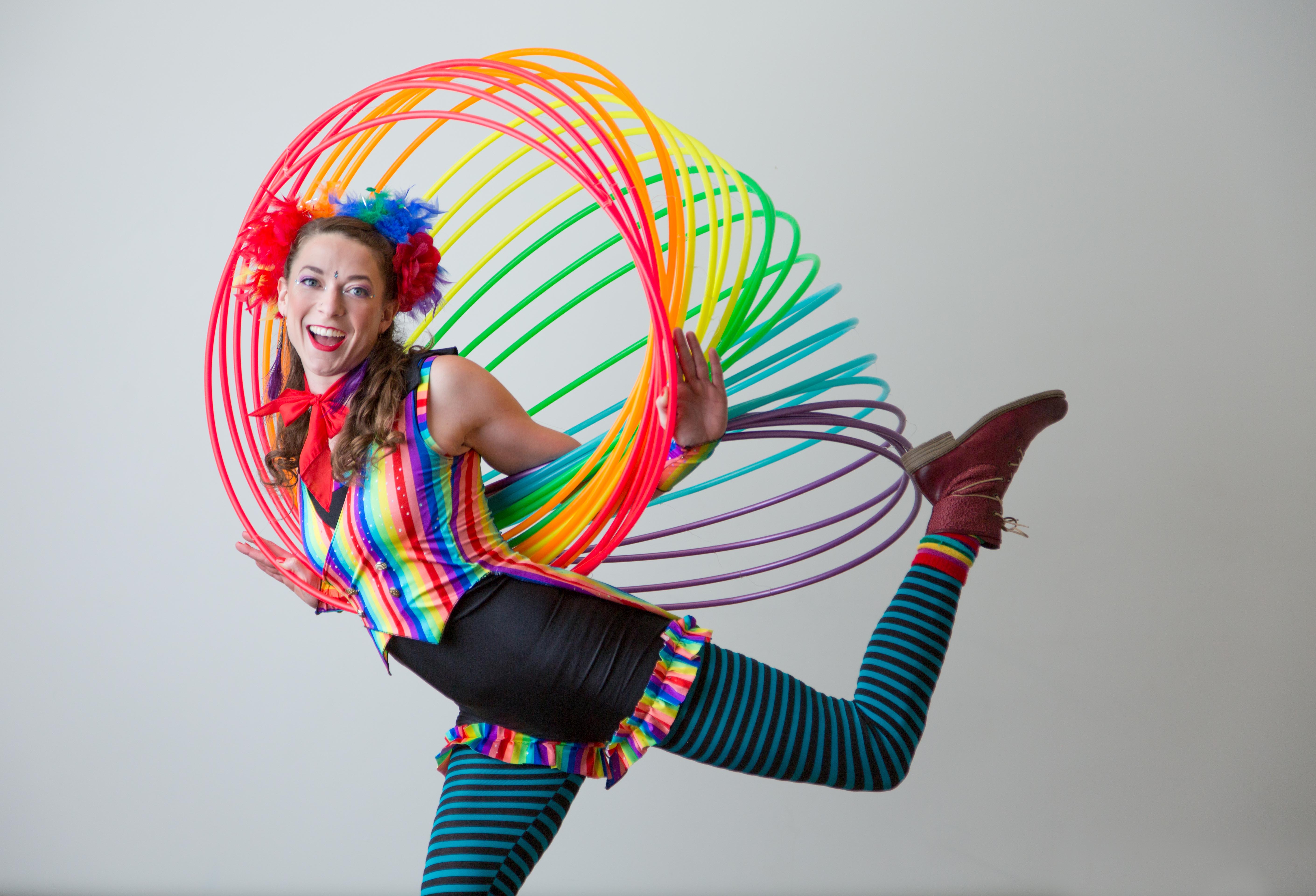 Woman with a hula Hoop rainbow
