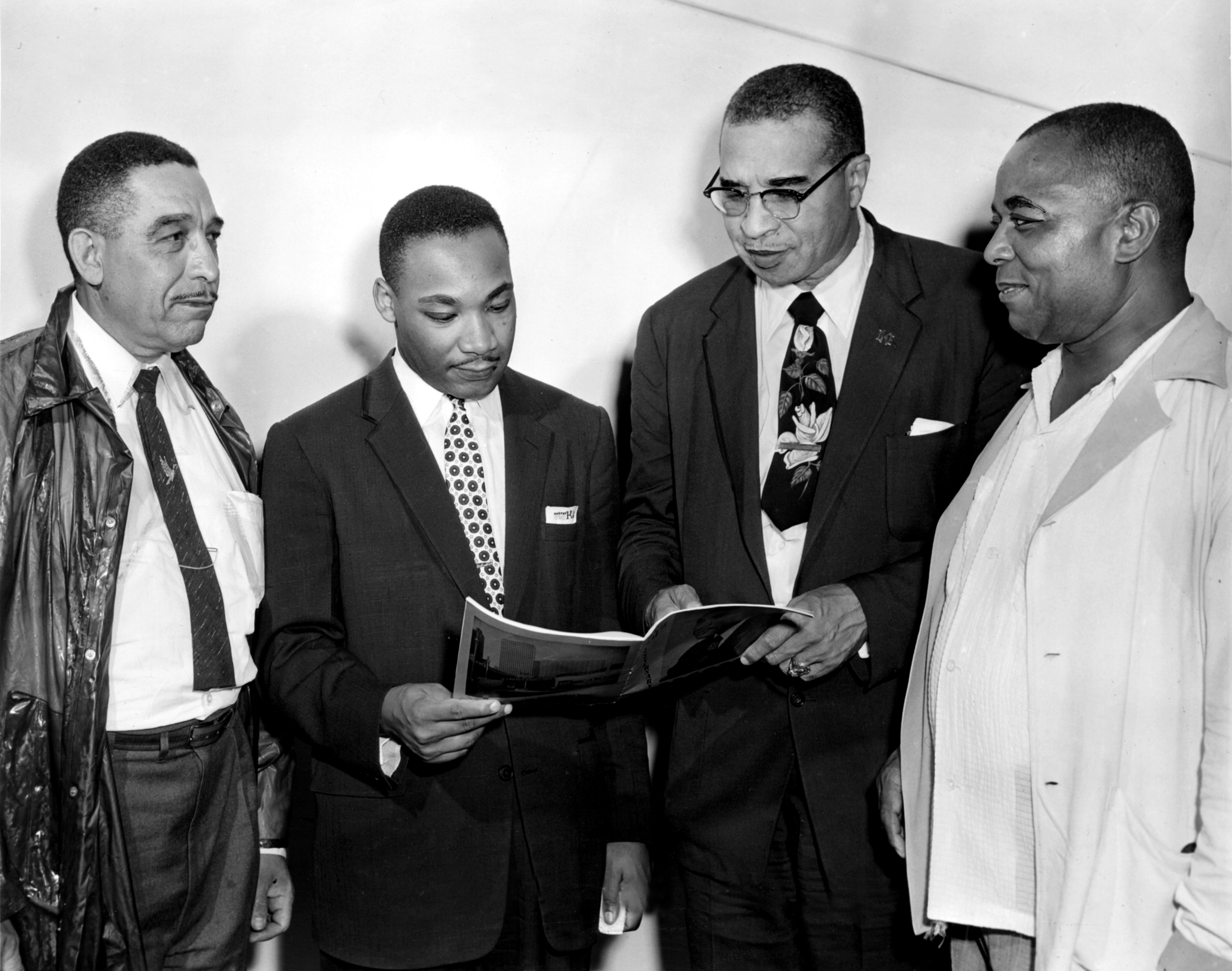 Martin Luther King Jr., Russel Small, Rev. Theodore S. Boone, and Walter Perry at Emancipation Day Celebrations in 1956