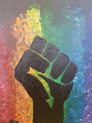 June's Pride Month Painting - A black fist on a rainbow background.