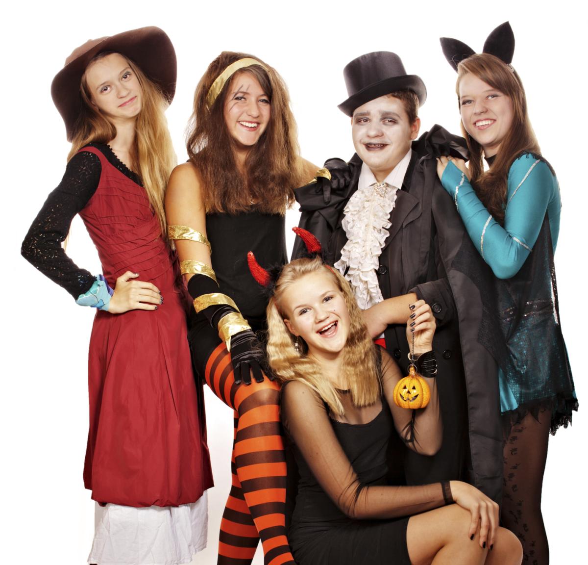 Teens in Halloween costumes