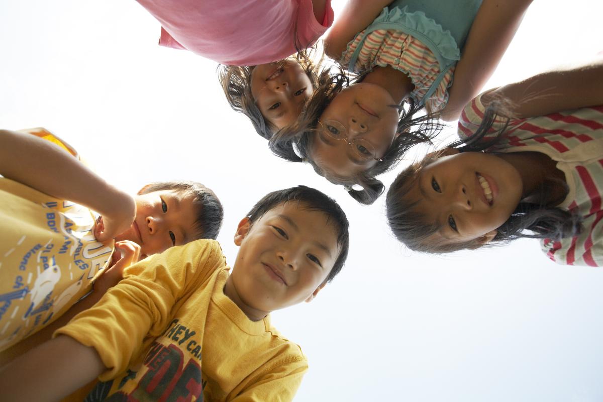 children looking down at camera